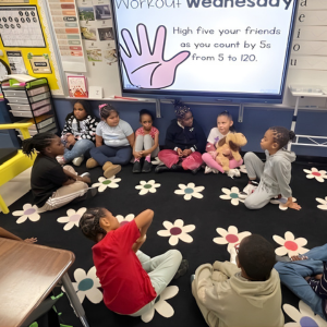 Oakmont Elementary student gather in a circle for their classroom lesson